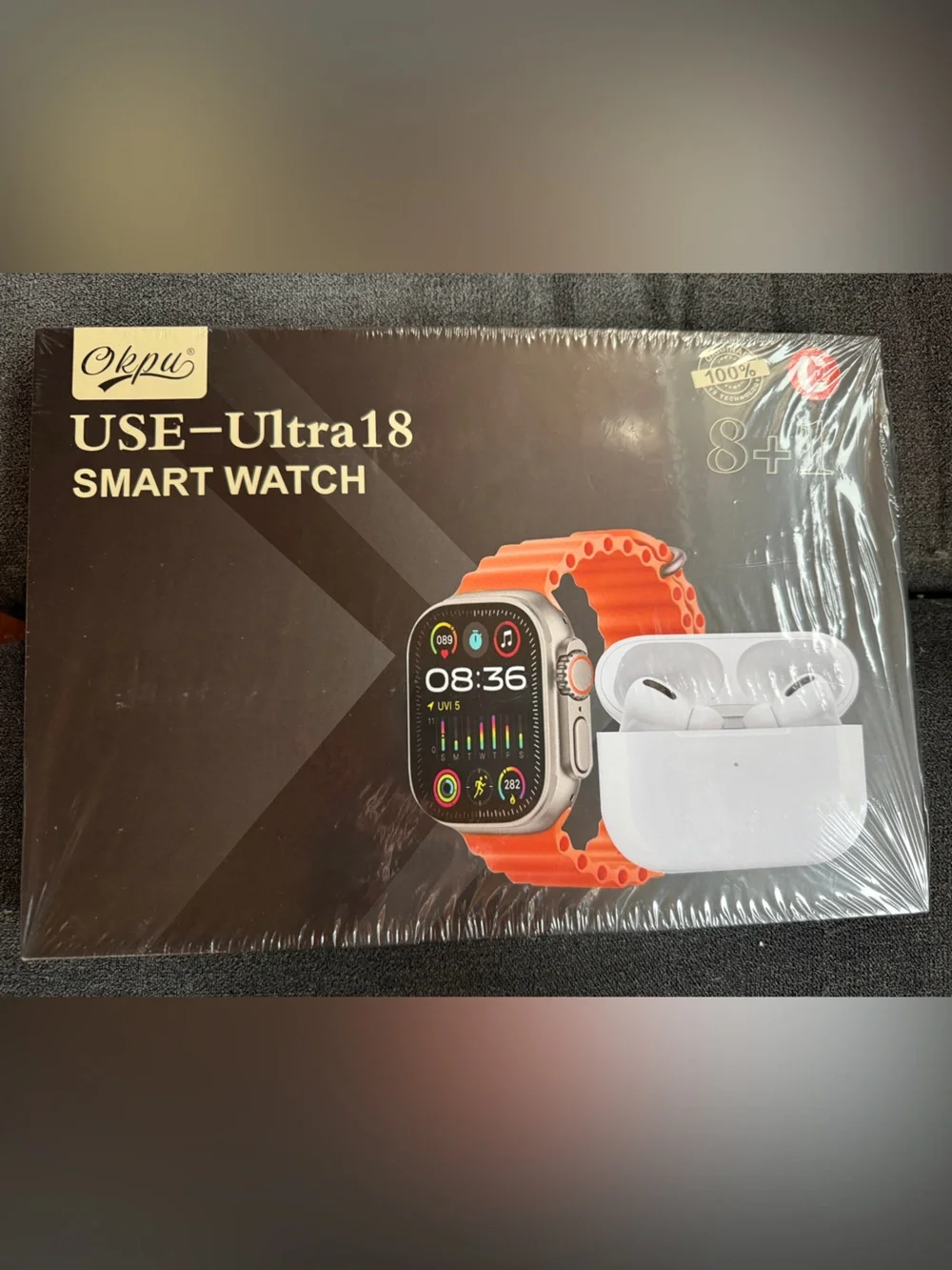 Smart Watch with Orange Band and Wireless Earbuds